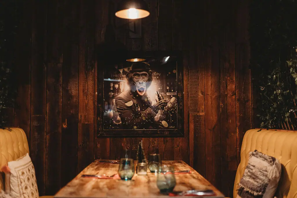 A booth table set for dinner